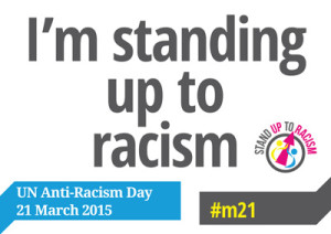 Im-standing-up-to-racism-sign600px