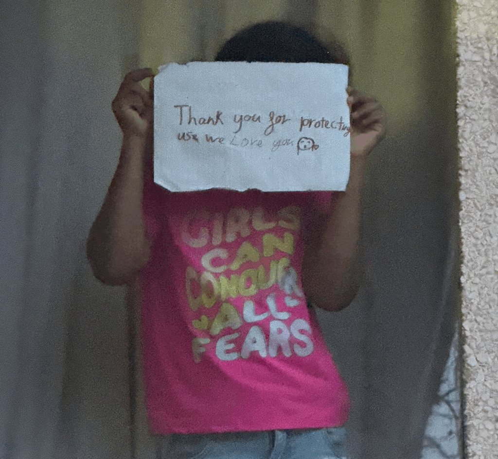 thank you for protecting us - sign from child refugees in bristol